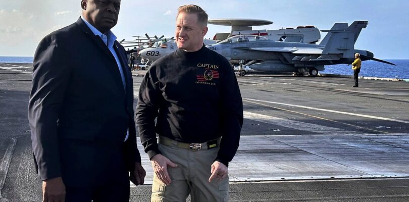 Austin makes unannounced visit to aircraft carrier Gerald R. Ford