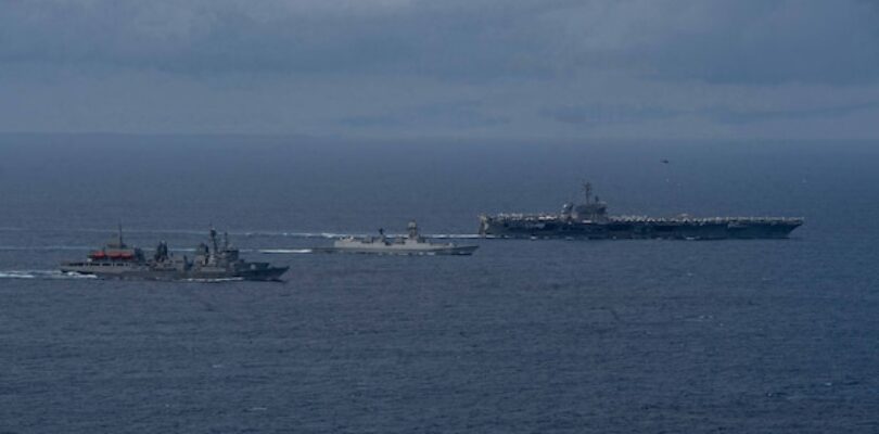 The Theodore Roosevelt Carrier Strike Group conducts joint maritime activity with Indian Forces