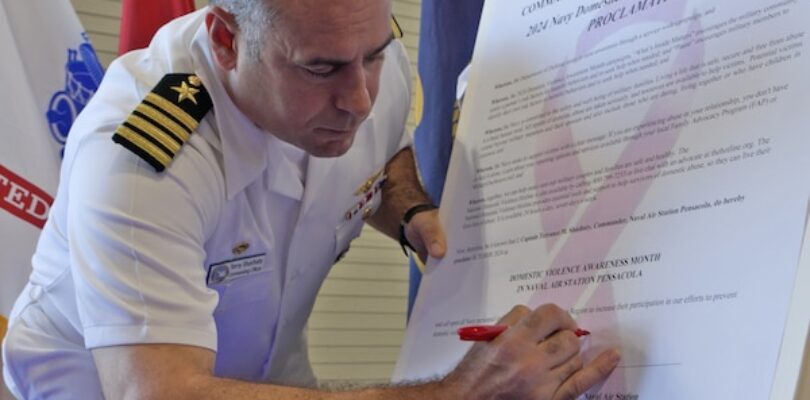 NAS Pensacola CO Signs Proclamation for Domestic Violence Awareness Month