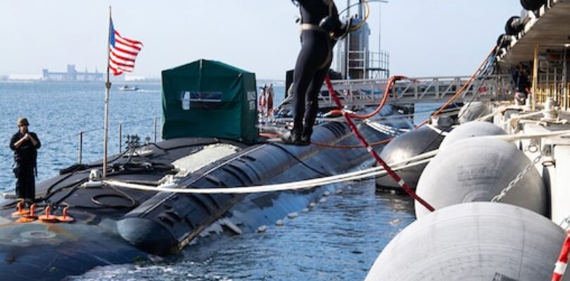 Three NUWC Division Newport engineering agents perform first modernizations to submarine in Australia